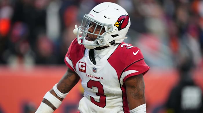 Cardinals safety Budda Baker reacts to his interception in the second half against the Denver Broncos.